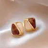 Pendientes de Alta Gama Color Café de Venta Caliente Transfronteriza Otoño e Invierno Nuevos Pendientes Estilo Borla 2026 Accesorios para Orejas Estilo Retro Hong Kong