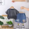 Ropa de verano transfronteriza para niños 2026 nuevo estilo niños degradado letra manga corta moda niños comercio exterior moderno atuendos