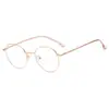 Nuevas Gafas Redondas Pequeñas Populares Transfronterizas con Filtro de Luz Azul Montura Metálica Abierta Estilo Universitario Gafas Planas Decorativas