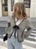 Cardigan suéter com blocos de cor estilo europeu e americano para outono e inverno, folgado de manga longa com design de amarração, jaqueta de tricô casual para mulheres, Amazon