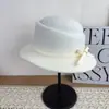 Nuevo Estilo Coreano Otoño/Invierno Estilo Hepburn Mezcla de Lana Cálido Moda Versátil Sombrero de Pescador Lazo Hace que la Cara se Vea Más Pequeña Moderno