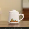 Taza de separación de té y agua de porcelana blanca Dehua, taza de oficina de jade color grasa de cordero, regalo de apertura de empresa para eventos de negocios con logotipo