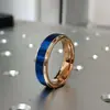 Anillo de Acero Inoxidable Color Oro Rosa Esmerilado de 8 mm Escalonado Oro Rosa con Acabado Mate Azul de Suministro Europeo y Americano de Amazon