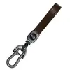 Llavero de PU llavero unisex cadena de cuerda para llave de coche de metal creativa colgante venta al por mayor transfronteriza