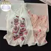 2026 Verano Ropa Fina para Casa para Mujer Estampado de Carácter Fa de Mahjong Gato KT Camisola de Encaje con Copas Set de Pijama