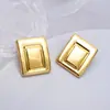 Europa y Estados Unidos aretes de acero inoxidable de moda de alta gama transfronterizos aretes irregulares de presión de aceite aretes de lujo ligero para mujer venta al por mayor