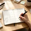 Planeador de tapa dura transfronterizo 2027, agenda de tapa dura A5, cuaderno de registro de autodisciplina para el trabajo y el estudio