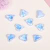 Nuevo diseño de corazón torcido con base puntiaguda de color moca, cristal de diamante, joyería para uñas, bricolaje, decoración para uñas de color macarrón.