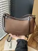 Bolso de mano pequeño de alta gama para mujer, nuevo bolso cruzado versátil de moda 2026, bolso de hombro popular de venta caliente, bolso tipo silla de montar súper moderno
