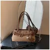 Bolso cruzado de moda transfronterizo 2026, nuevo diseño de nicho, con cinturón decorado, personalidad dulce y genial