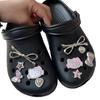 Accesorios para zapatos de cueva linda chica de dibujos animados corazón de niña zapatos hebilla de zapato de flor lazo gato hebilla decorativa desmontable accesorios al por mayor