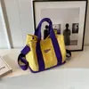 Bolso de Lona tipo Cesta Casual Europeo y Americano Bordado con Letras Bloques de Color 2023 Nuevo Bolso de Mano Bolso de Hombro con Textura Vintage