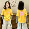 Camiseta infantil listrada de manga longa 2026 novo modelo de algodão puro top moderno e estiloso super fofa roupa de menina