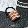 Sentido de Diseño Minimalista Anillo para el Cabello Cabeza de Bola de Aleación Cabeza de Tendón de Goma Cuerda para el Cabello Sentido Avanzado Lazo para el Cabello Anillo para el Cabello Cuerda para el Cabello Cubierta de Cuero para Mujer