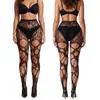 Medias sexys de encaje rasgadas irregulares de red de pescado SHEIN para mujer sexy caliente, pantimedias negras caladas