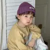 Gorro de Piel de Melón para Niños Otoño e Invierno Cálido Estilo Coreano Gorro de Lana Etiqueta de Costura Inglesa Gorro de Punto de Color Puro para Niños y Niñas