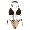 Bikini nuevo transfronterizo de Amazon, traje de baño reversible de lunares para mujer, conjunto de traje de baño de dos piezas con cuello halter para damas