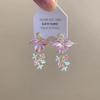 Pendientes de circonita con forma de mariposa para hombre y estrella, diseño de nicho para mujer, ligeros, de lujo, a la moda, elegantes y combinables, 2025