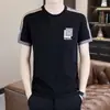 Camiseta de Manga Corta para Hombre Estilo Británico Marca de Moda Casual 2026 Camiseta de Alta Gama Holgada Casual Top de Media Manga Ropa para Hombre