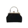 Bolso tejido retro de nicho para mujer 2025 nuevo transfronterizo de gran capacidad con cierre de clip en el hombro cadena bandolera bolso concha