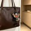 Campana de Agua Natural Cáscara de Fruto de Alcanfor Colgante de Dibujos Animados Carrillón de Viento Terminado Bolsa de Semillas Curativas Decoración Popular en Zonas Turísticas Llavero Lindo