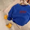 Camisetas Infantis de Primavera e Outono para Meninos e Meninas, Roupas de Bebê Estilosas, Versão Coreana da Moda, Camiseta Básica Fashion com Estampa de Letras