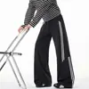 Calças casuais masculinas de retalhos listrados estilo americano, corte ajustado, calças esportivas de perna reta, calças largas da moda para o outono