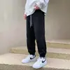 Venta Directa de Fábrica Pantalones Deportivos para Hombre Estilo Primavera y Otoño Marca de Moda Holgados Elásticos Jogger Cargo Pantalones Largos Deportivos Casuales