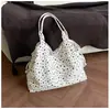 Bolso grande informal y relajado estilo coreano para mujer, nuevo diseño de nicho 2026, bolso tote, bolso de hombro y para llevar debajo del brazo