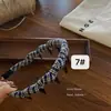 Diadema de tela con estampado de leopardo dentada, Moda retro francesa, Pinza para el pelo de alta gama, Accesorio para el cabello, Nuevo 2026
