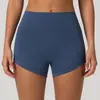 Pantalones de yoga estilo europeo y americano color durazno nude para realzar glúteos, control de abdomen, shorts de secado rápido, pantalones de fitness ajustados de tres puntos, pantalones deportivos para correr