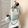 Bolsa de muñeca de algodón de 20 cm, versátil y linda, nueva bolsa transparente de un solo hombro cruzada para mujer, bolsa ita básica simple