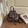 Mochila Feminina Transfronteiriça Nova Estampa de Leopardo Mochila Feminina Pequena Bolsa Jeans Retrô Bolsa de Ombro Único Transversal Estilosa de Nicho
