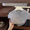 Traje estilo Academia para niñas Primavera y Verano 2025 Camisa Polo de Punto de Manga Corta Estilo Occidental para Bebé Niña Falda Corta Plisada Vestido de Verano