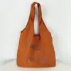 Bolsa Colete de Nylon 2025 Novo Estilo Simples e Versátil Bolsa Tote para o Dia a Dia Feminina Casual Grande Capacidade Bolsa de Compras com Letra