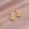Pendientes Pacíficos de Candado Xiangyun para Mujer, Pendientes de Ojo de Gato Microincrustados de Gama Alta de Nicho, Pendientes Versátiles y Exquisitos