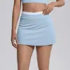 Nova saia curta color block sem costura transfronteiriça, saia esportiva meia-saia canelada de cintura alta com falso duas peças, saia de tênis anti-exposição, roupa de yoga