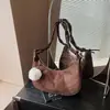 Bolso de Luna de Gama Alta para Mujer 2026 Estilo Nuevo Lujo Ligero Estilo Miu Bolso de Hombro Único Cruzado Versátil Casual para Viajes Diarios Bolso de Mujer