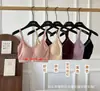 Conjunto de lingerie feminina sem costura com bojos fixos, sutiã bralette push-up, calcinha fio dental e sutiã minimizador para busto grande com calcinha de corte reto atacado