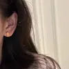 Pendientes de Flor de Iris Dorados de la Antigüedad Media 2025 Nuevas Explosiones Pendientes Retro Únicos de Gama Alta Pendientes para Mujer