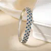 Pulseira de zircônia cravejada em cobre com duas fileiras de diamantes quadrados para mulheres Europeia e Americana pulseira de diamante colorido de luxo leve banhada a ouro nicho sensação de alta qualidade joias transfronteiriças