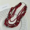Collar Gargantilla de Flor Roja con Borla de Perlas Multicapa de Lujo Ligero y Exquisito Collar de Moda Cadena para Clavícula de Gama Alta
