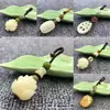 Raíz de Bodhi Tallado Flor de Loto Raíz de Loto Hoja de Loto Bolsa de la Suerte Colgante Pequeño Creativo Llavero Cadena de Teléfono Móvil Colgante