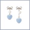 Ver también azul bruma otoño e invierno nuevos pendientes de bola de pelo azul juego de cuatro piezas pequeños y exquisitos pendientes de alto valor pendientes