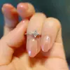 Anillo Estrella de Cuatro Hombres para Mujer Lujo Ligero Elegante Elegante Zirconia Estrella Viajero Apertura Anillo Ajustable Nuevo Venta al por Mayor