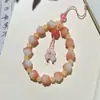 Colgante de pata de gato muy atractivo quemado al carbón, pulsera colorida de raíz de bodhi, cadena para teléfono anti-pérdida, accesorios, llavero para bolso al por mayor