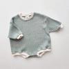 Ropa de estilo coreano ins4 colores de algodón waffle de color sólido de manga larga envuelta en pedos suave y versátil ropa infantil de estilo occidental