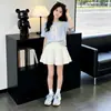 Nuevo Conjunto de Dos Piezas de Moda Veraniego Estilo Coreano Estilo Universitario con Chal Camiseta de Manga Corta con Lazo Dulce Falda para Niños Mayores