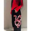 Calça Feminina Solta Casual Fina Estilo Hip-Hop Streetwear Americano 2024 Novo Design de Nicho Calça de Moletom Estampada
