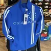 Sudadera cárdigan retro americana con cuello alto para hombre y mujer, nuevo estilo primavera y otoño, chaqueta corta bordada con estrellas, top deportivo
